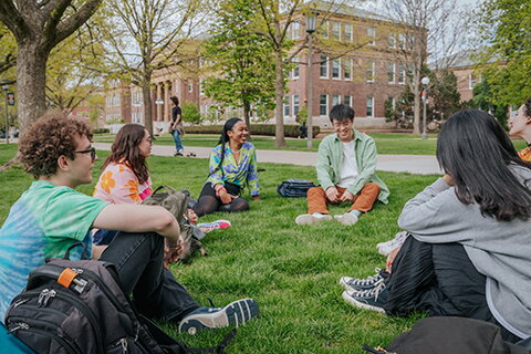 Students sitting on the Main Quad